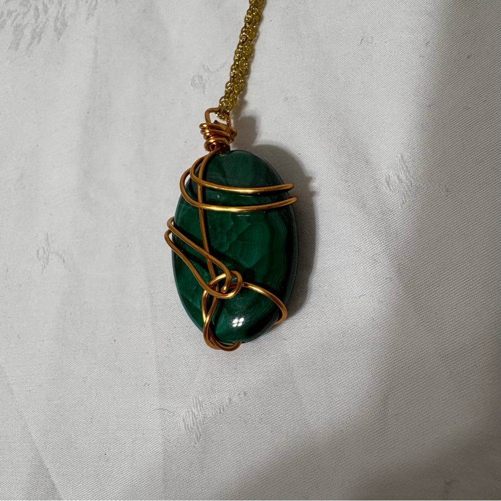 malachite wire-wrapped pendant with a gold-toned chain. - Picture 1 of 6